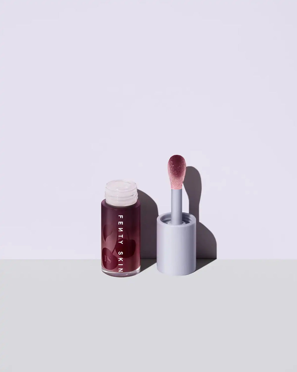 Fenty Treatz Hydrating + Strengthening Lip Oil — Black Cherry